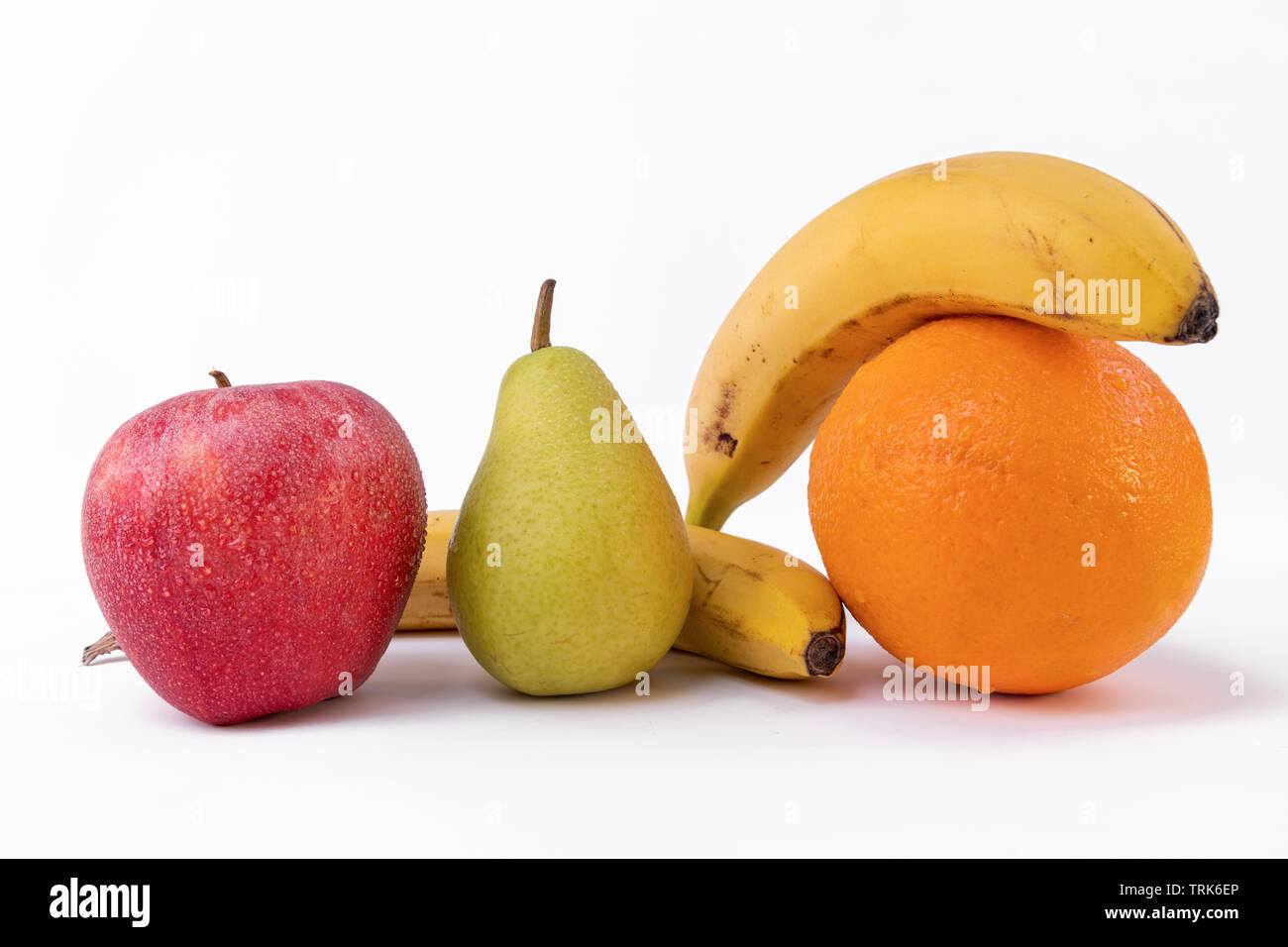 beautiful composition apple, pear, orange and banana on White