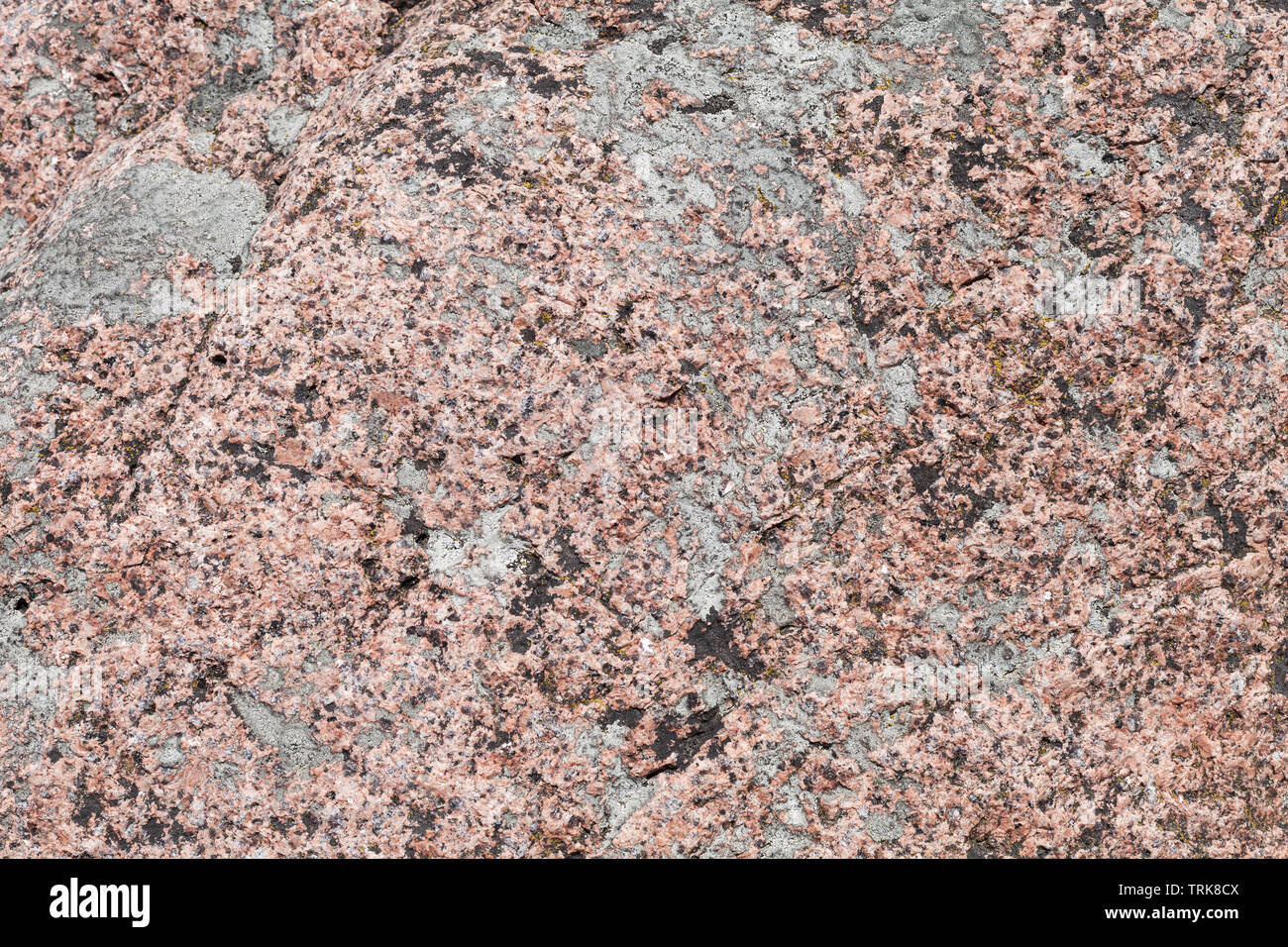 Natural granite stone with  lichen on it,  close up background photo texture Stock Photo