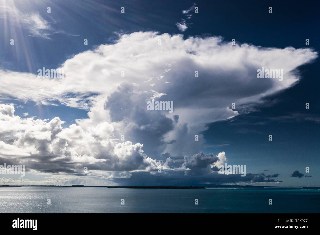 Cumulus Cloud over Balgai Bay, Lissenung, New Ireland, Papua New Guinea Stock Photo
