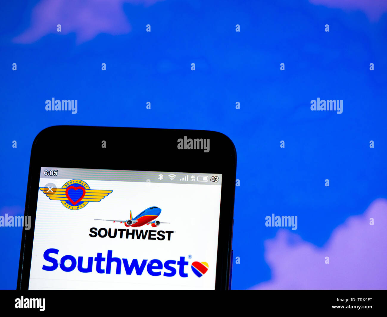 In this photo illustration the Southwest Airlines logo is seen displayed on a smartphone Stock Photo