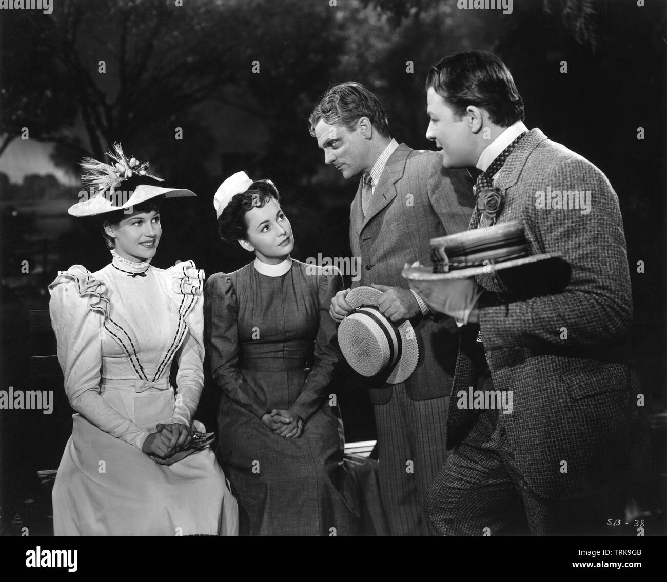 RITA HAYWORTH OLIVIA de HAVILLAND JAMES CAGNEY and JACK CARSON in THE STRAWBERRY BLONDE 1941 director Raoul Walsh Warner Bros. Stock Photo