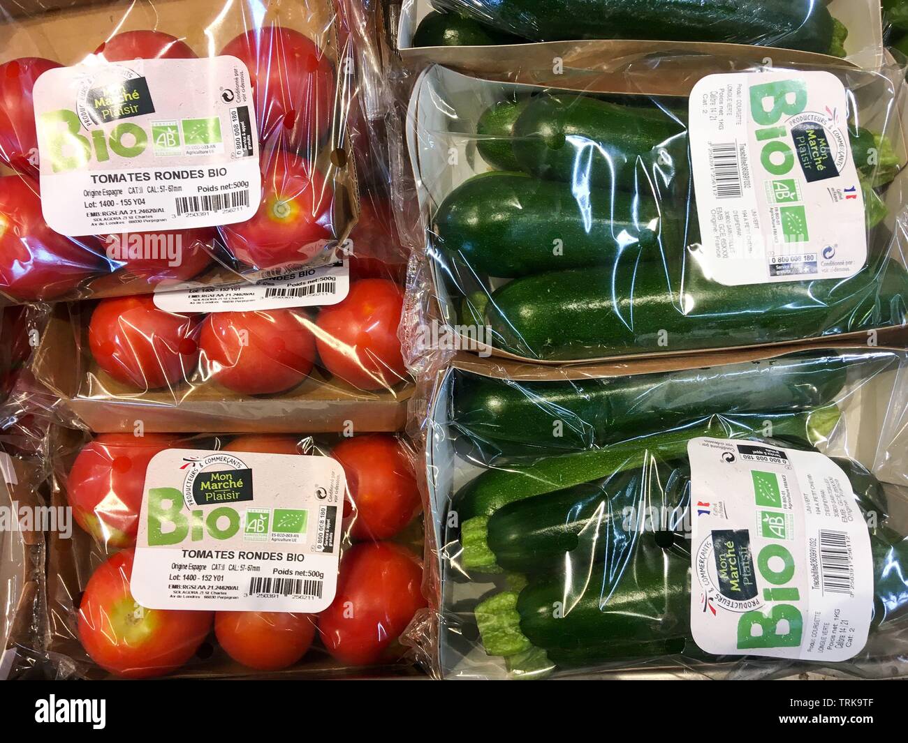 Organic vegetables packaged in plastic blister packs, France Stock Photo