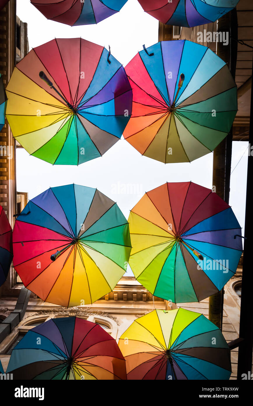 Colorful umbrellas in the sky of the Victoria Passage, in Bucharest city centre, Romania Stock