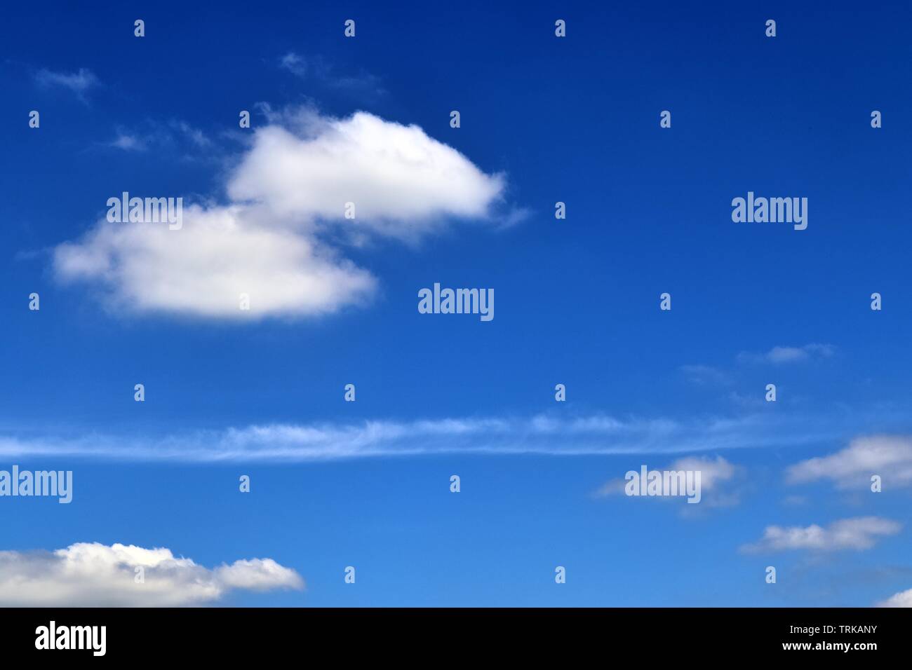 Beautiful calming fluffy white clouds in a deep blue summer sky Stock ...
