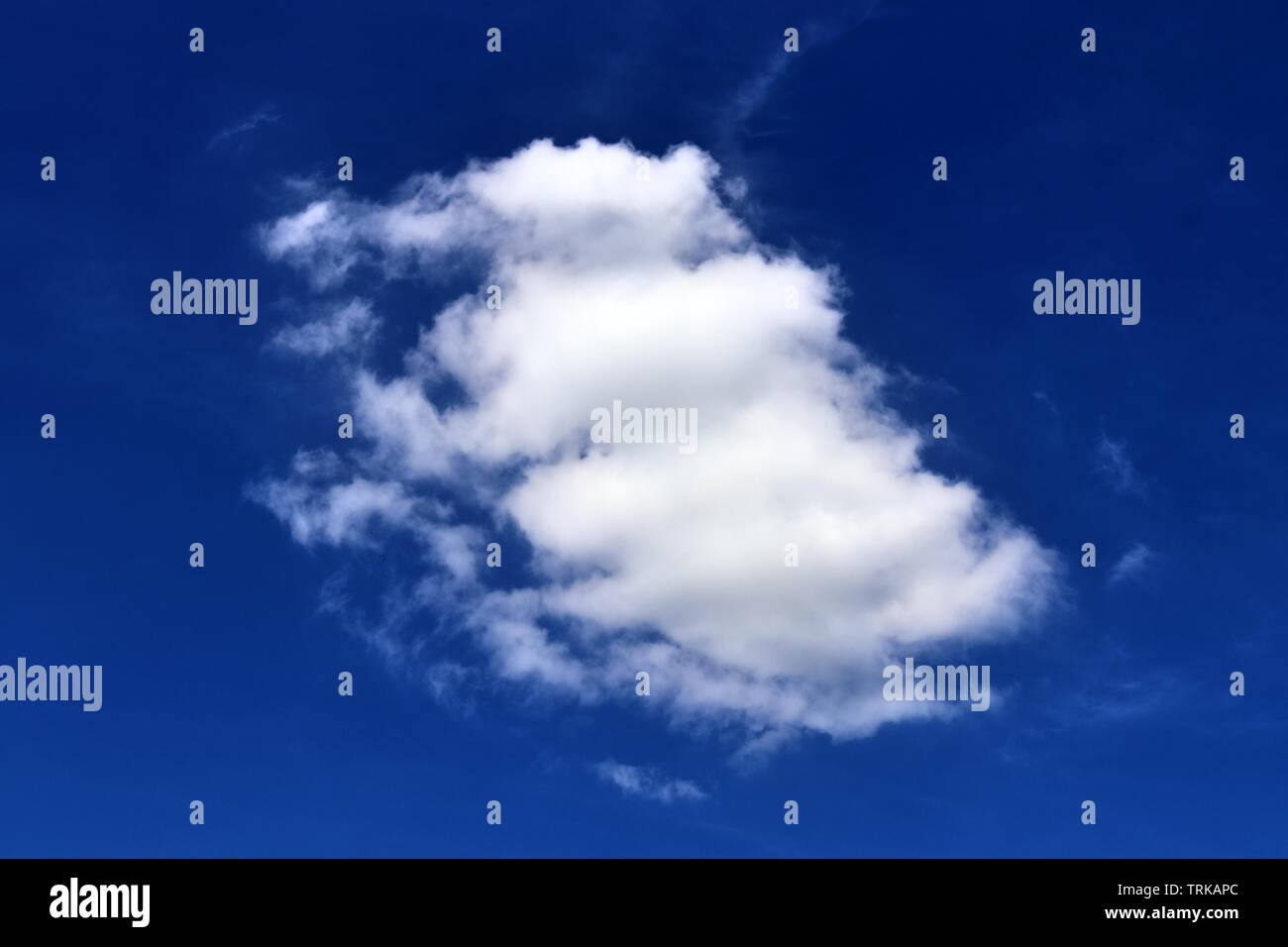 Beautiful calming fluffy white clouds in a deep blue summer sky Stock ...