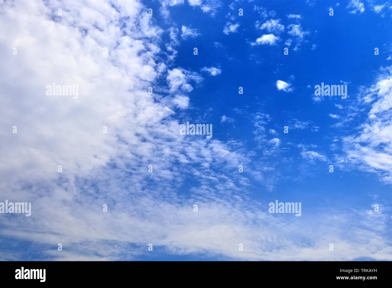 Beautiful calming fluffy white clouds in a deep blue summer sky Stock ...