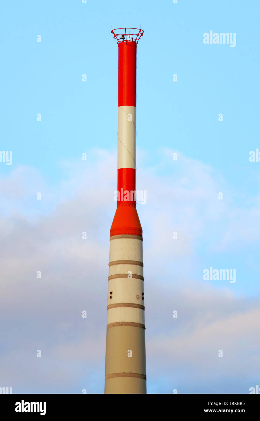 top of a television tower with red and white warning markings Stock Photo
