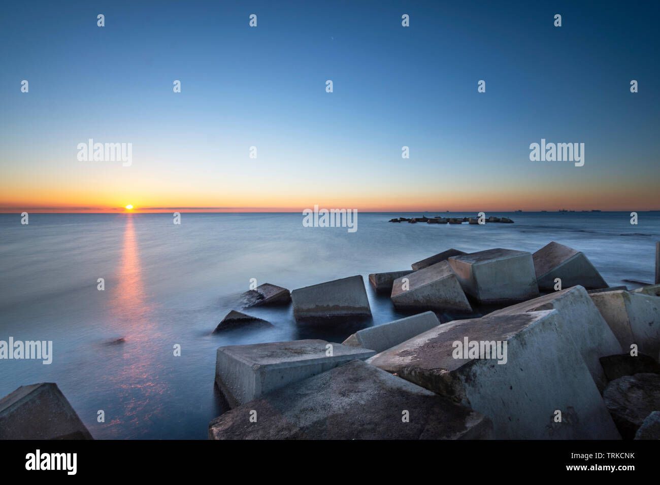 the sun rising on the beach Stock Photo