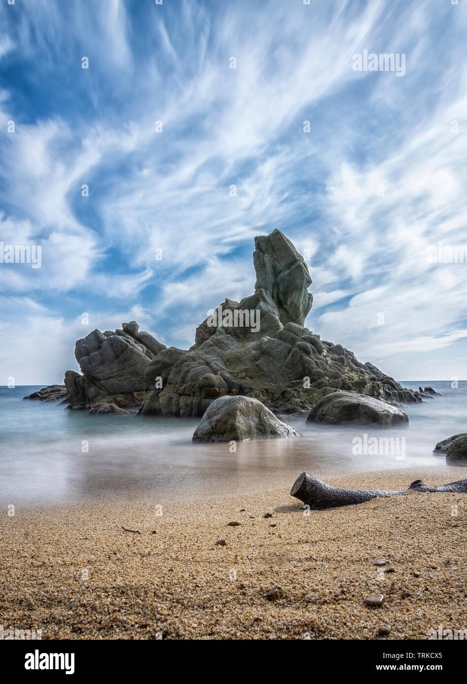 Rocky beach landscape of the Costa Brava, Catalonia, Spain. Extraordinary rock formations in the sea. Cala de la Roca del Paller Stock Photo