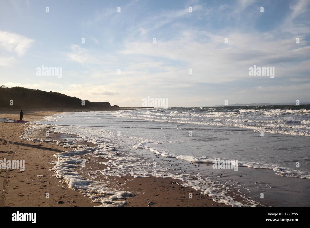 Quiet beach and blue sky, escape at midday Stock Photo