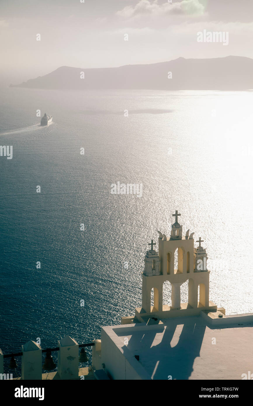 A cruise ship departs Santorini, Greece. Stock Photo