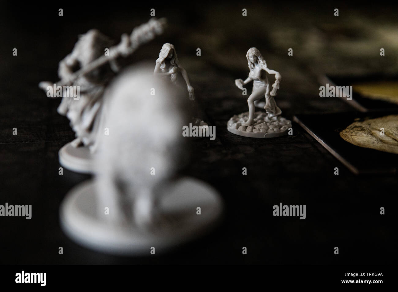 Miniatures from the board game Kingdom Death Monster by Adam Poots Stock Photo