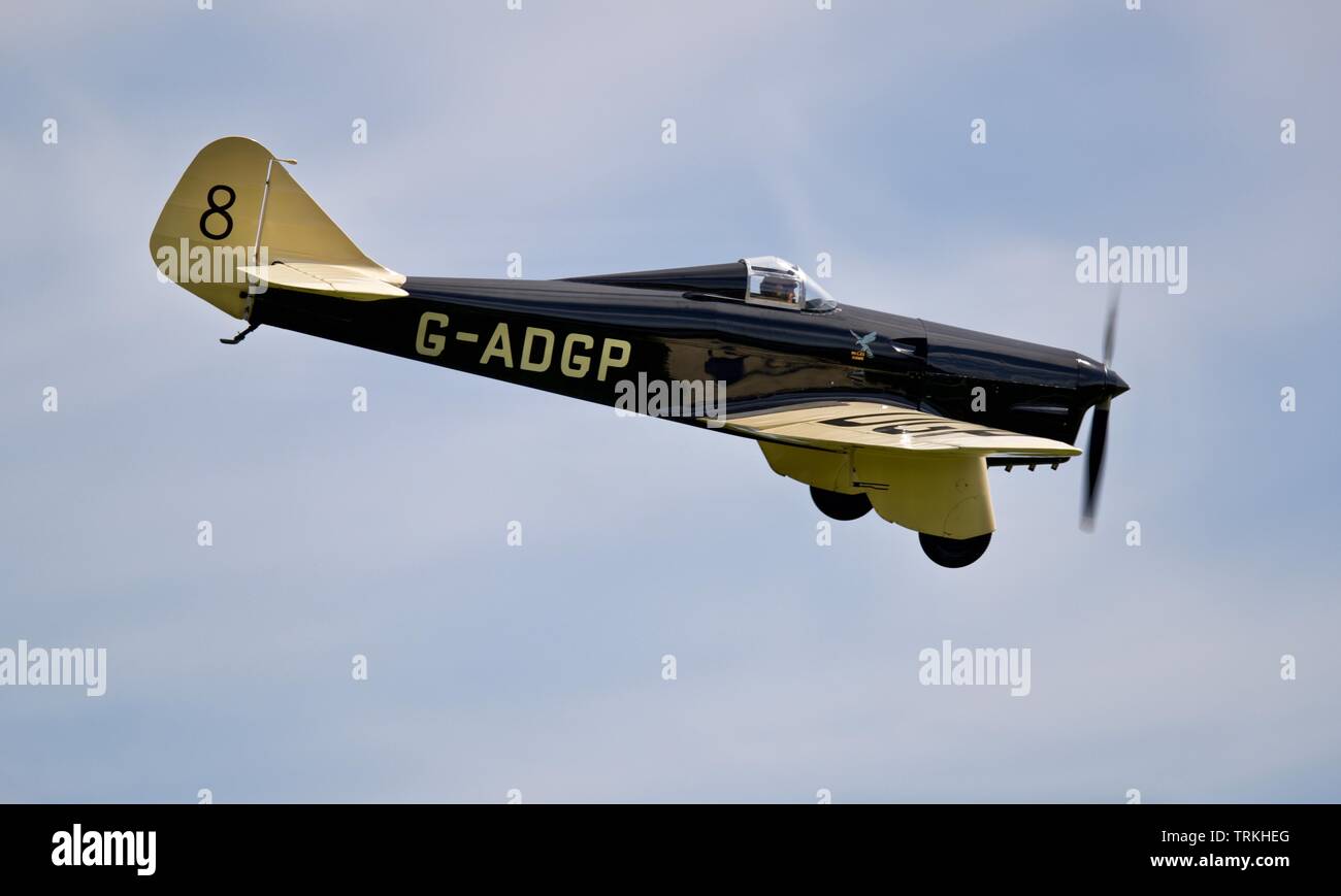 1935 Miles Hawk Speed Six airborne at the 2019 Shuttleworth Flying Festival Stock Photo
