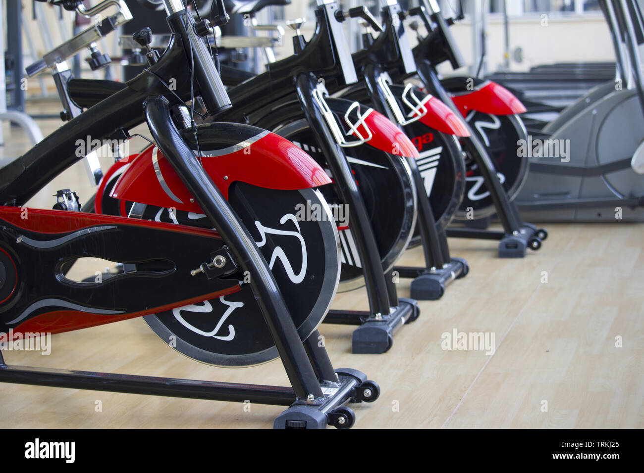 Row of training exercise bikes detail. Healthy lifestyle concept Stock ...
