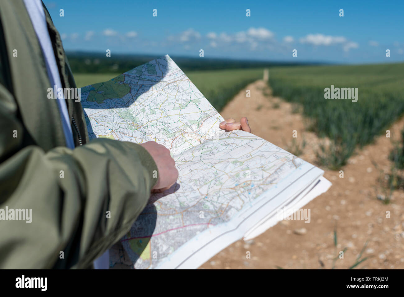 Close up of map reading while rambling through the countryside Stock Photo