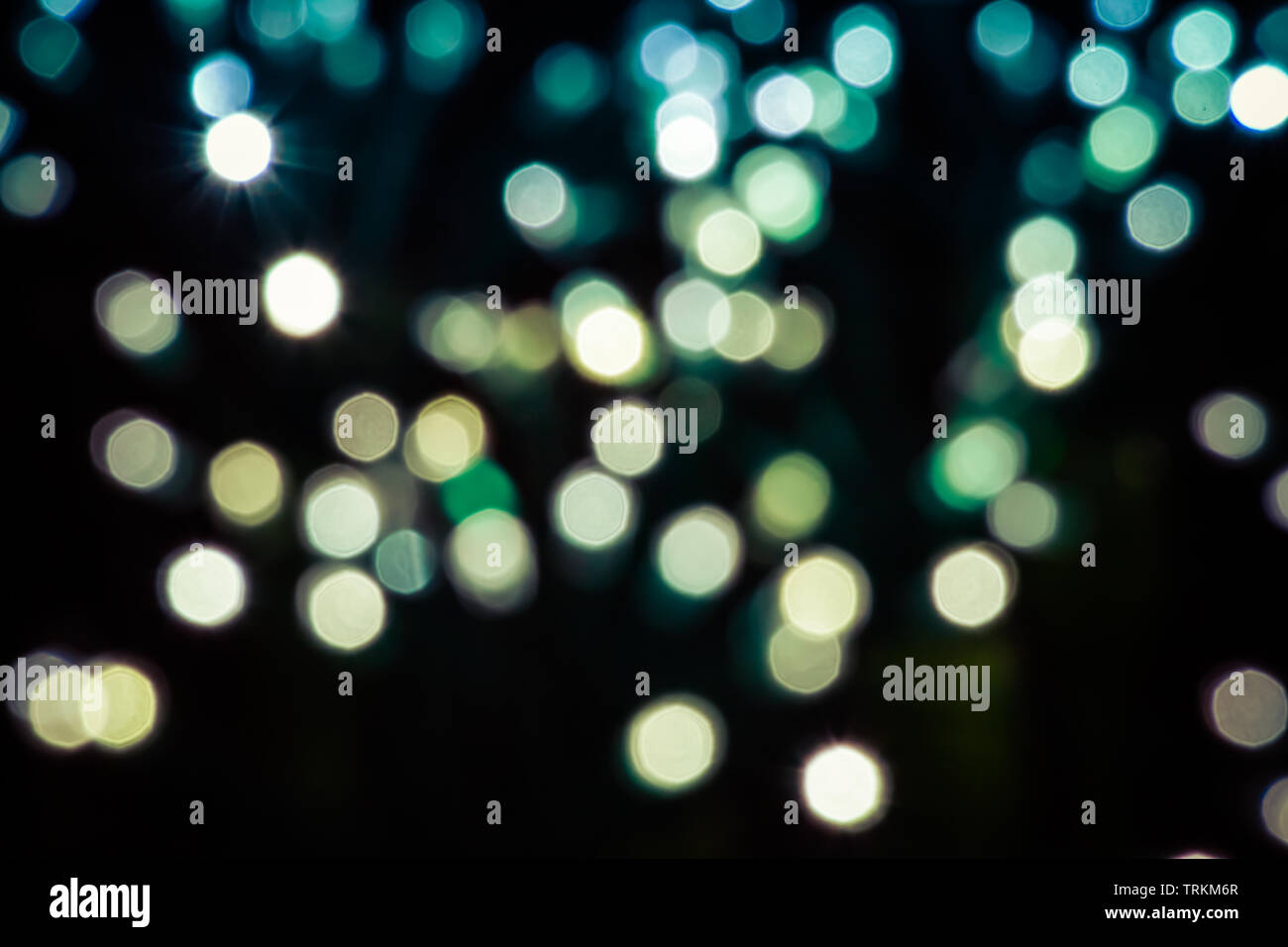 A Bokeh effect background utilizing random lights with cool tones colors  Stock Photo - Alamy