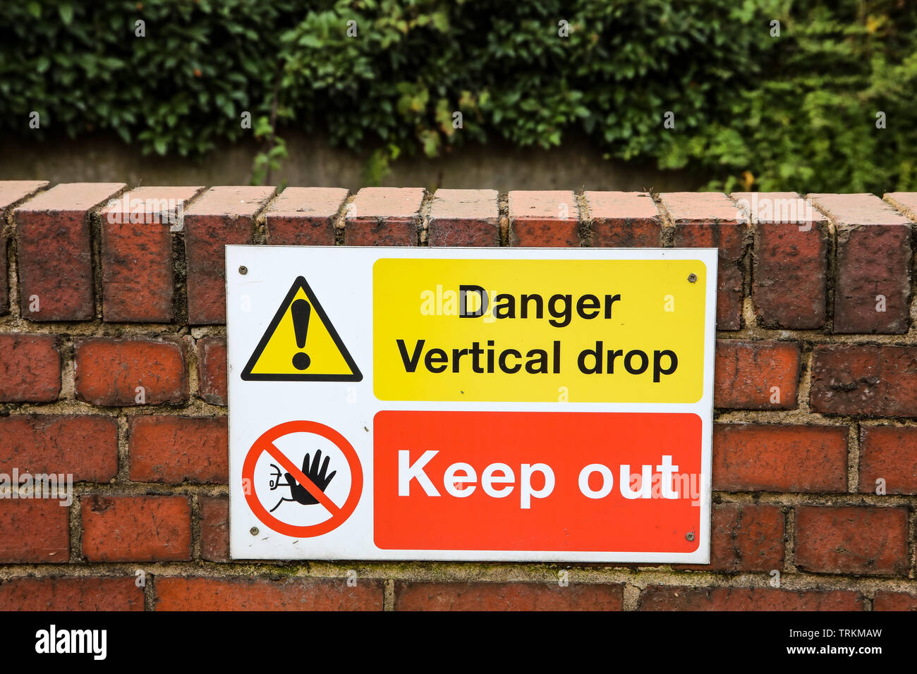 Danger Vertical Drop Sign and Keep Out Sign Stock Photo