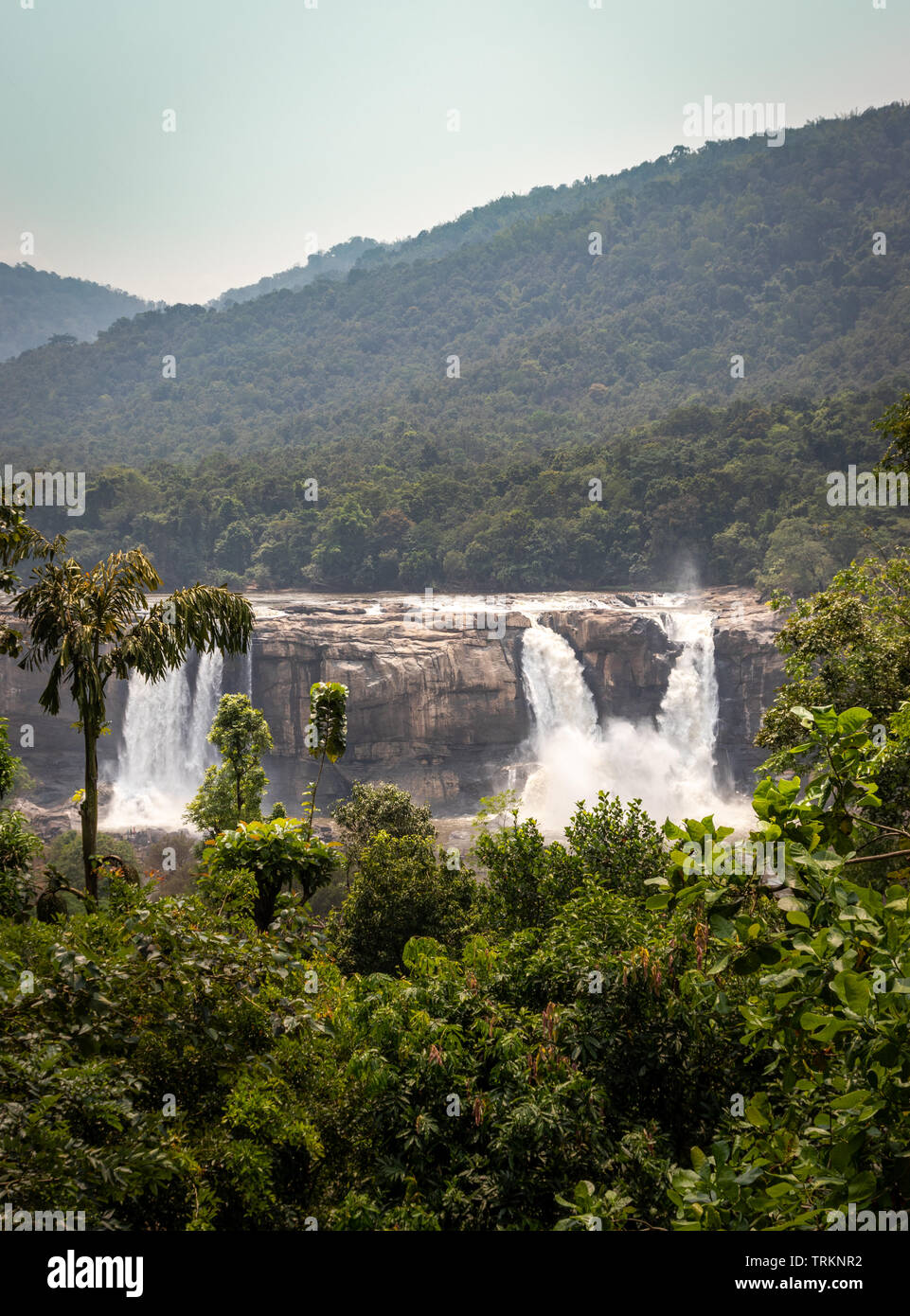 This is the athirapally waterfall kerala india in the middle of the western ghat range. It is falling from 80 mtrs high hill and it is the second larg Stock Photo