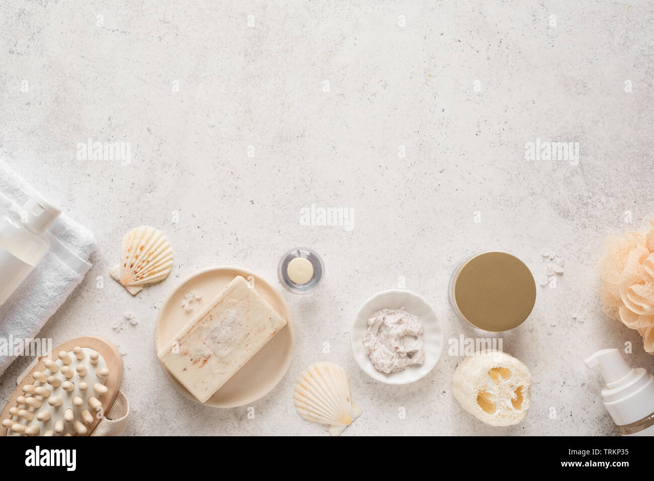 Bath Accessories on white stone background, top view, copy space. Daily