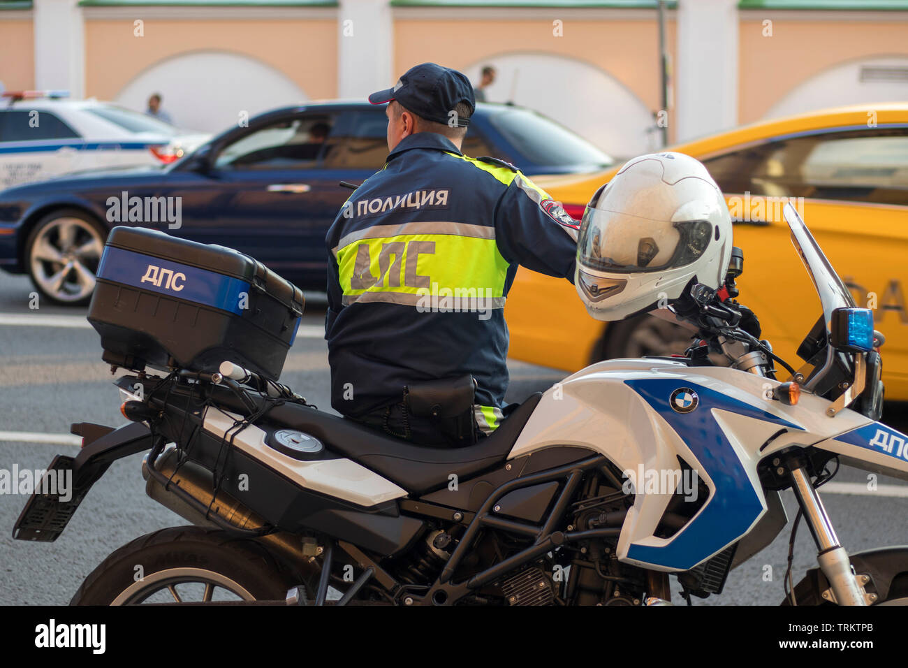 Moscow, RUSSIA - June 7, 2019: The inspector of the road police patrol on the service motorcycle controls the road. Stock Photo