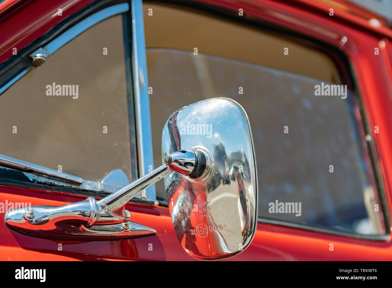 Wattrelos,FRANCE-June 02,2019: View of the side mirror of an old Renault Dauphine. Stock Photo