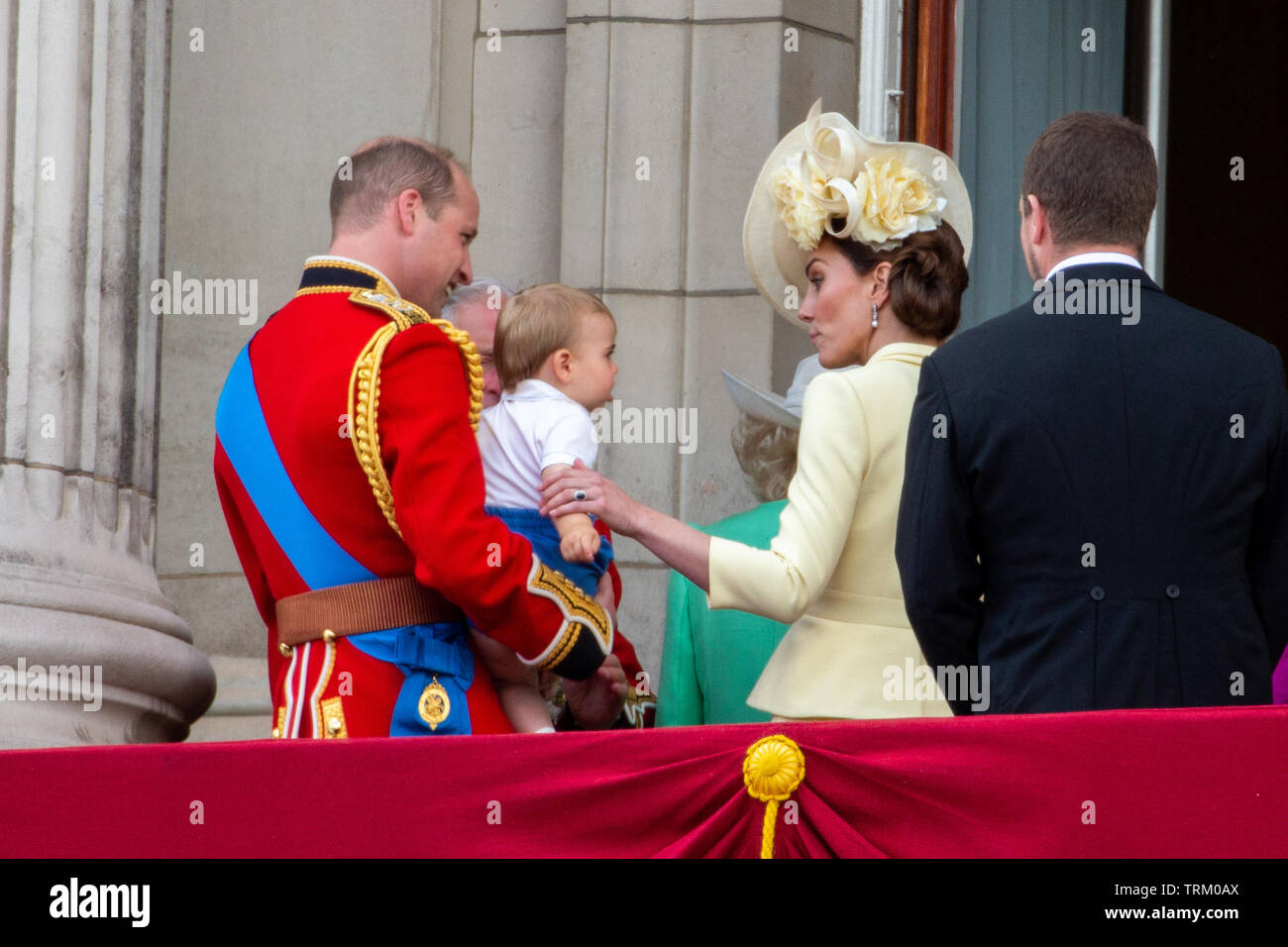 Picture dated June 8th shows Prince William, Catherine Duchess of Cambridge, Prince Louis,  at the Trooping the Colour in London today.   The Queen's official birthday has been marked with the annual Trooping the Colour parade. She was joined by members of her family and thousands of spectators to watch the display in Horse Guards Parade in Whitehall. The Prince of Wales, the Duchess of Cornwall, the Duke and Duchess of Cambridge and the Duke and Duchess of Sussex all attended. The Queen celebrated her 93rd birthday in April. The royal colonels - the Prince of Wales, colonel of the Welsh Guard Stock Photo