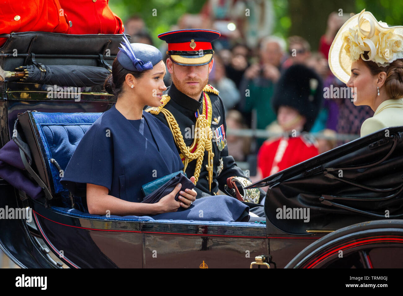 Picture dated June 8th shows Meghan,Duchess of Sussex,Prince Harry and Catherine Duchess of Cambridge at the Trooping the Colour in London today.   The Queen's official birthday has been marked with the annual Trooping the Colour parade. She was joined by members of her family and thousands of spectators to watch the display in Horse Guards Parade in Whitehall. The Prince of Wales, the Duchess of Cornwall, the Duke and Duchess of Cambridge and the Duke and Duchess of Sussex all attended. The Queen celebrated her 93rd birthday in April. The royal colonels - the Prince of Wales, colonel of the W Stock Photo