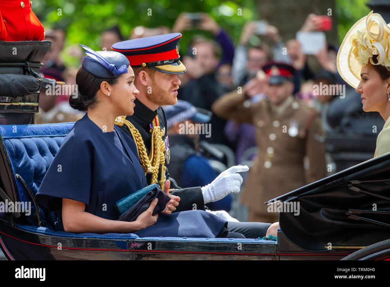 Picture dated June 8th shows Meghan,Duchess of Sussex,Prince Harry and Catherine Duchess of Cambridge at the Trooping the Colour in London today.   The Queen's official birthday has been marked with the annual Trooping the Colour parade. She was joined by members of her family and thousands of spectators to watch the display in Horse Guards Parade in Whitehall. The Prince of Wales, the Duchess of Cornwall, the Duke and Duchess of Cambridge and the Duke and Duchess of Sussex all attended. The Queen celebrated her 93rd birthday in April. The royal colonels - the Prince of Wales, colonel of the W Stock Photo