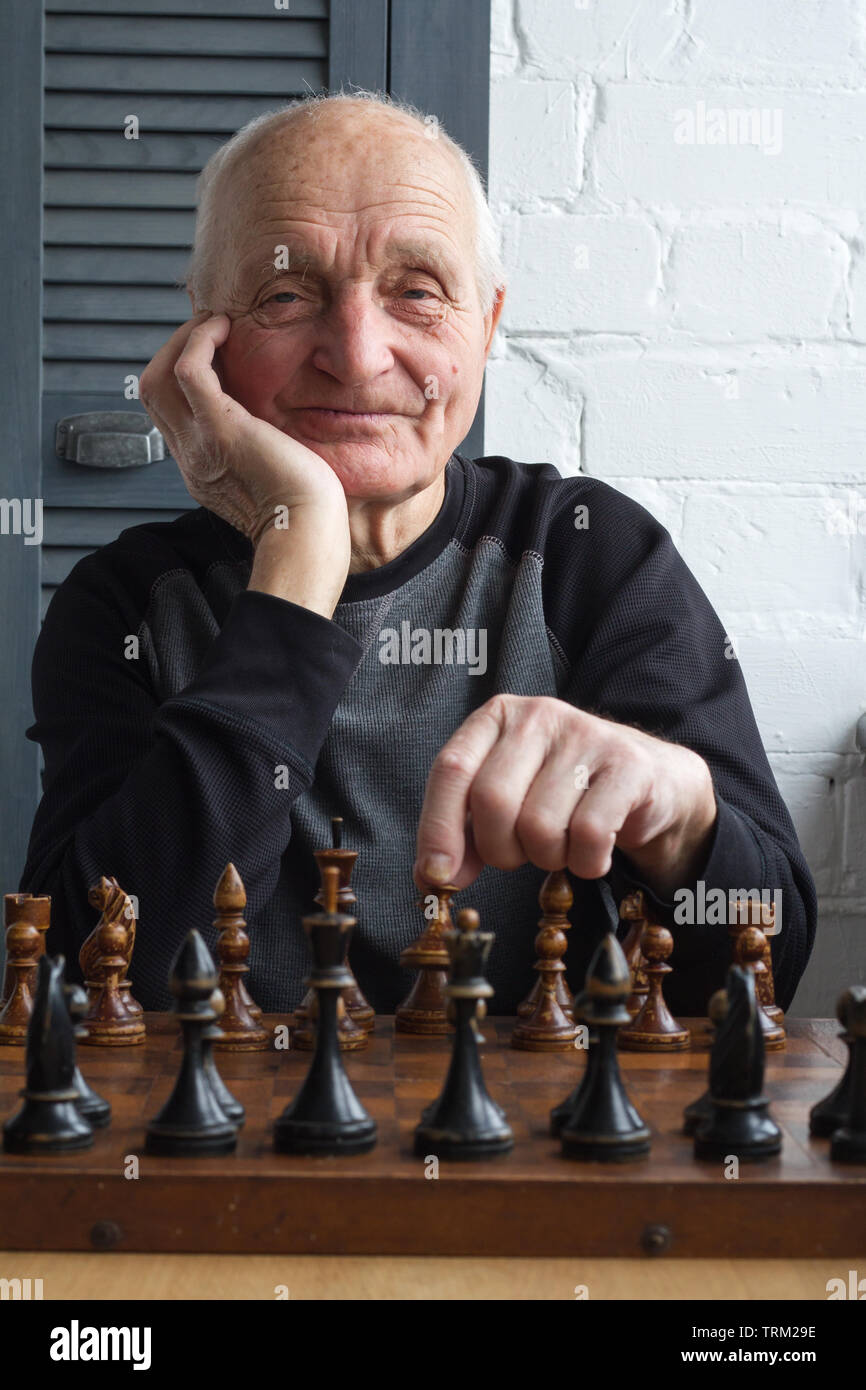 Playing Chess. Man Thinking about His Next Chess Move Stock Image - Image  of strategy, game: 213752197