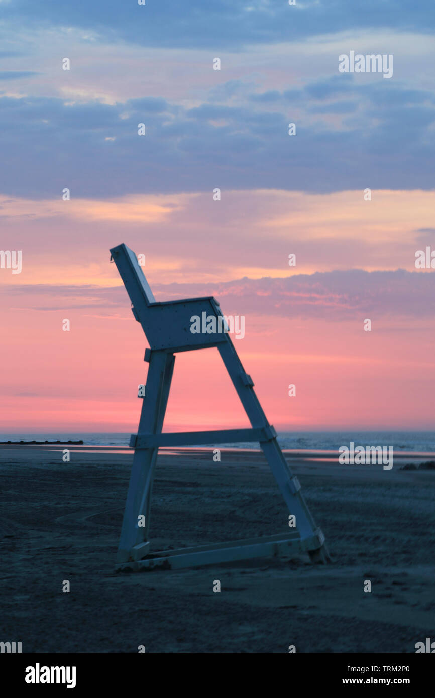 A lifeguard chair on the beach at sunrise. Wildwood, New Jersey, USA
