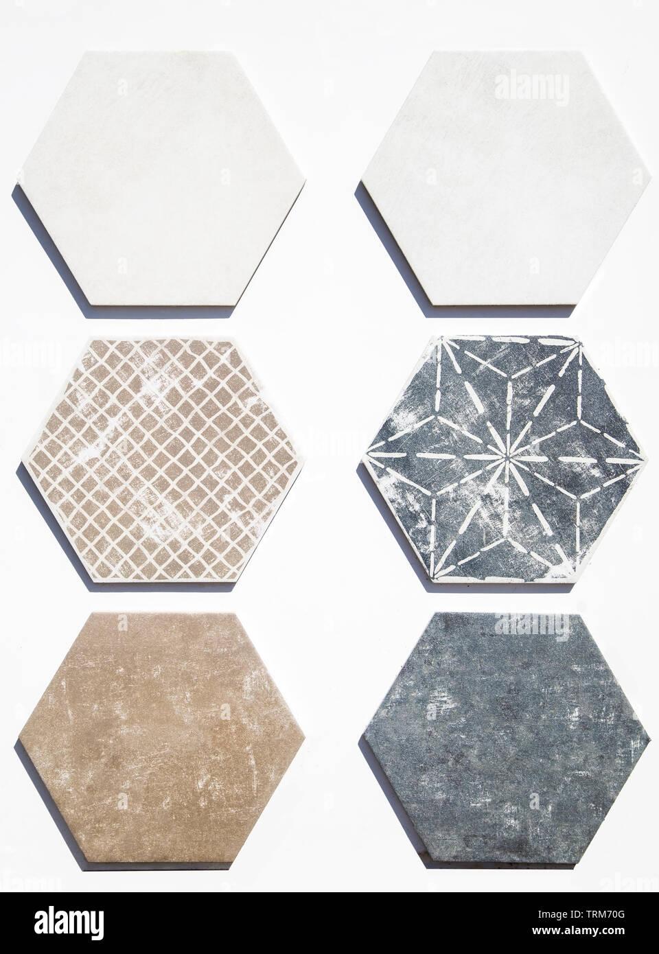 Various ceramic tiles on white background Stock Photo