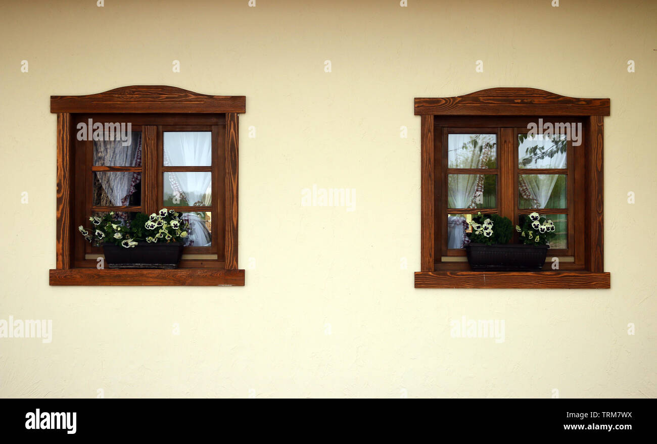 wooden windows and flowers old house detail Stock Photo - Alamy