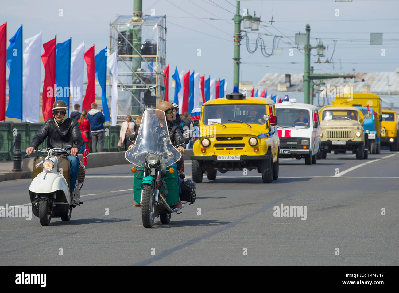SAINT-PETERSBURG, RUSSIA - MAY 25, 2019: A column of retro transport on the Palace Bridge. Fragment of the parade of retro vehicle in honor Stock Photo