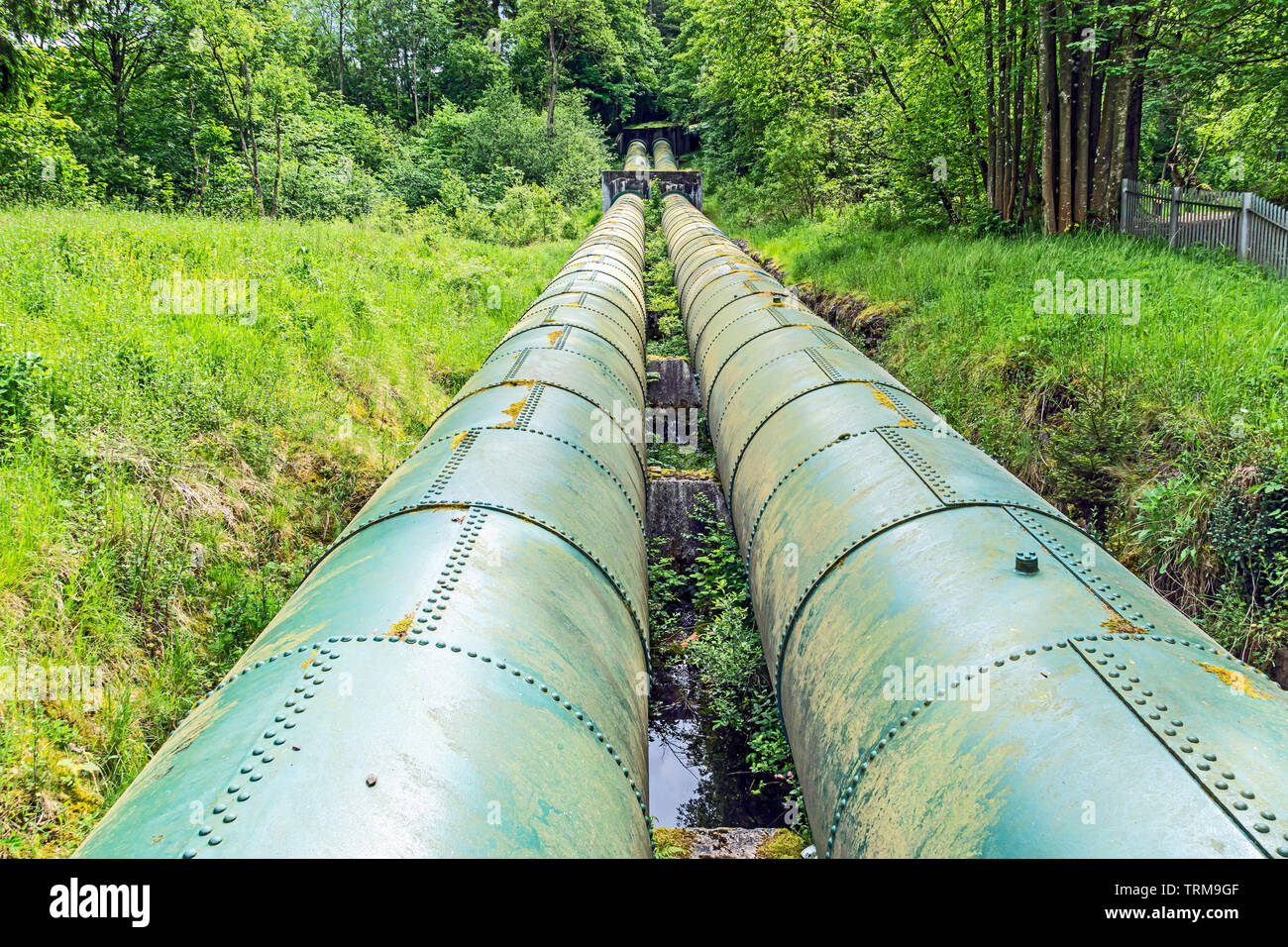 Water pipes from River Clyde to Bonnington Power Station, part of Lanark Hydro Scheme on River Clyde near New Lanark South Lanarkshire Scotland UK Stock Photo