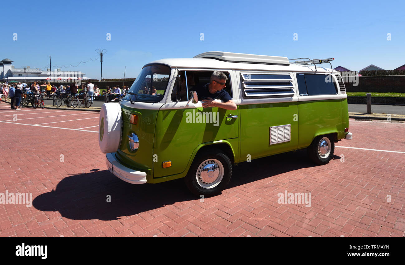 : Classic Green & White Volkswagen  Camper Van being parked Stock Photo