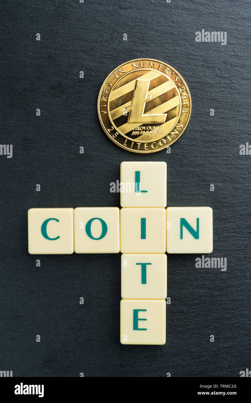 Physical Litecoin gold coin with text made out of letter tiles