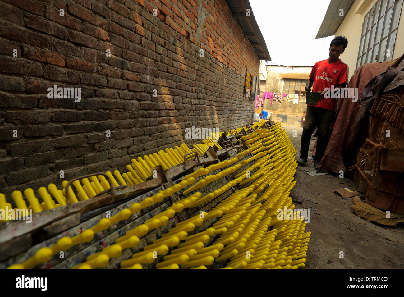 Drying rubber balloons under the Sun. Dhaka, Bangladesh Stock Photo