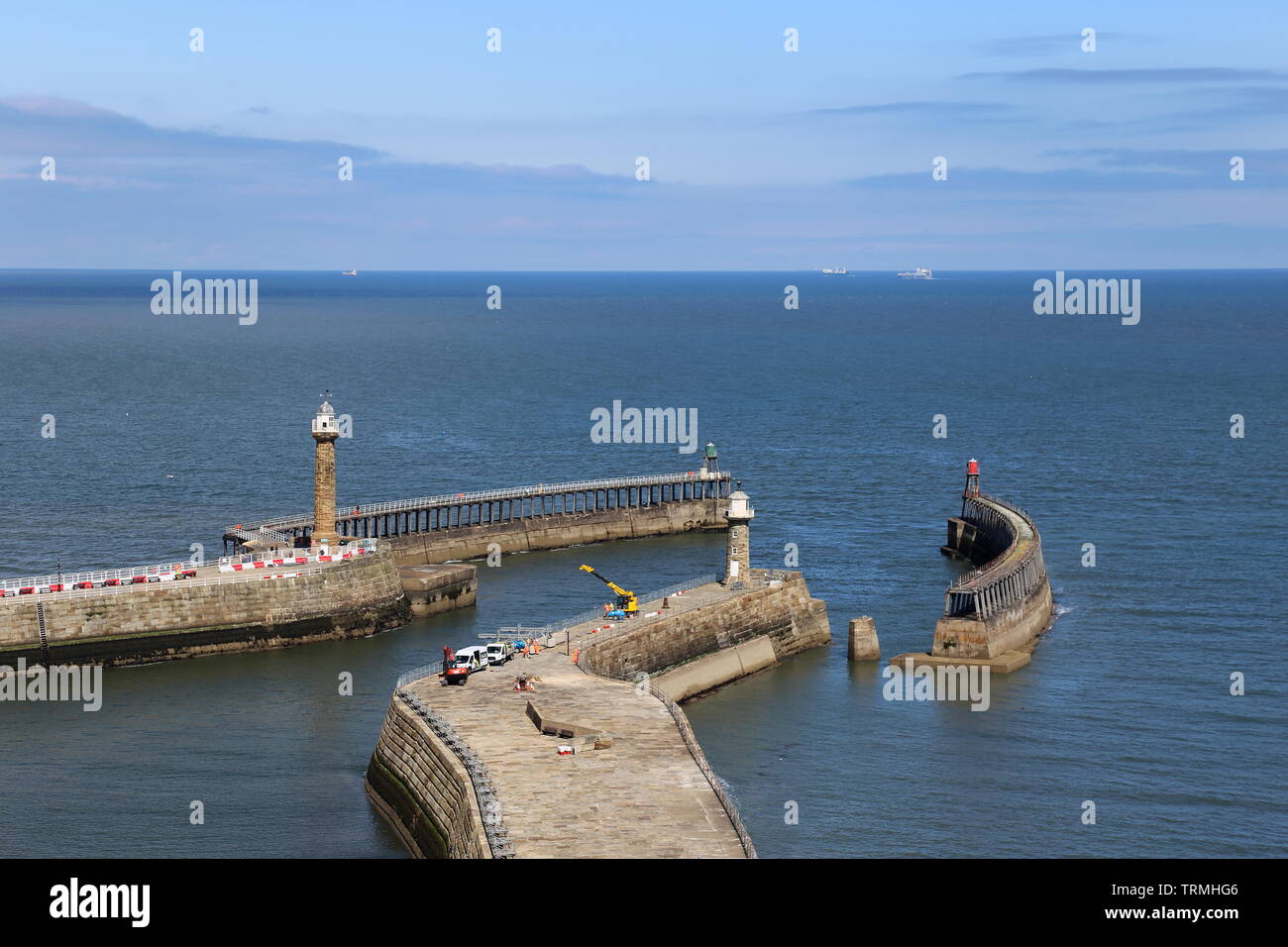 West and East Piers from St Mary's churchyard, Whitby, Borough of Scarborough, North Yorkshire, England, Great Britain, United Kingdom, UK, Europe Stock Photo