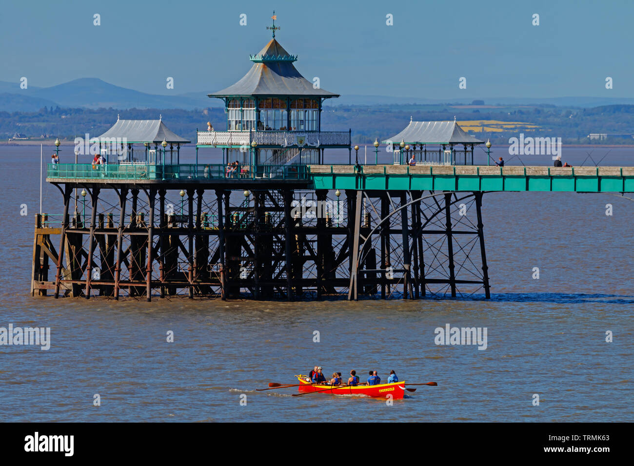 Pier and pilot gig on a sunny day Stock Photo