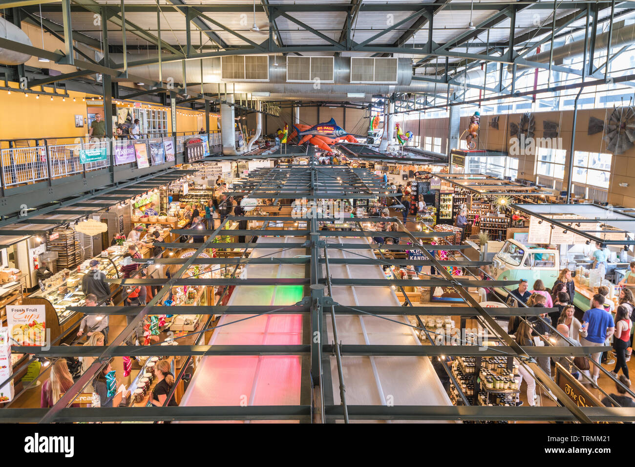 MIILWAUKEE, WISCONSIN - MAY 19, 2018: Shoppers in the interior of Milwaukee Public Market. The market opened in 2005. Stock Photo