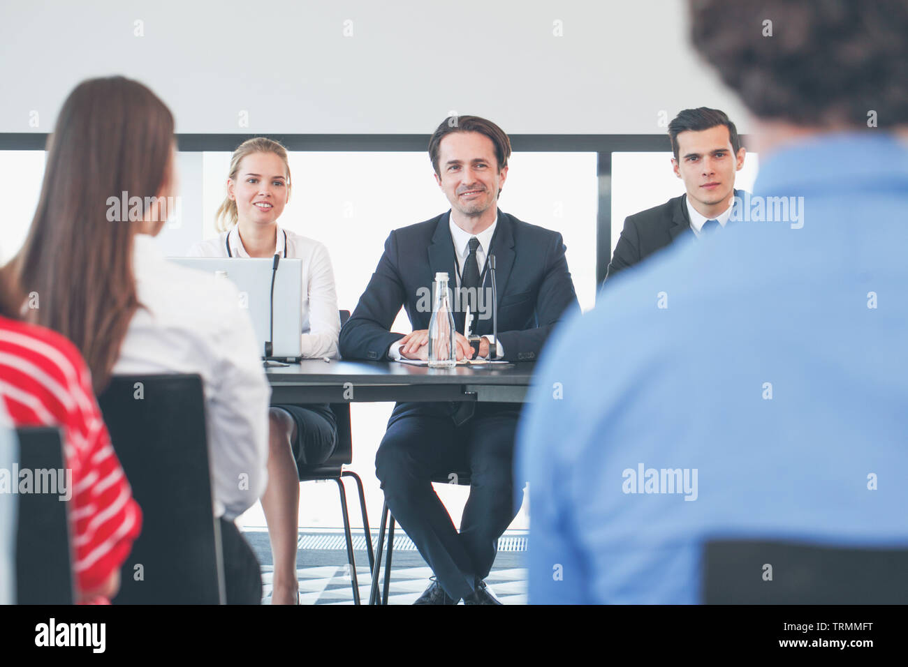 Group business people raise hi-res stock photography and images - Alamy