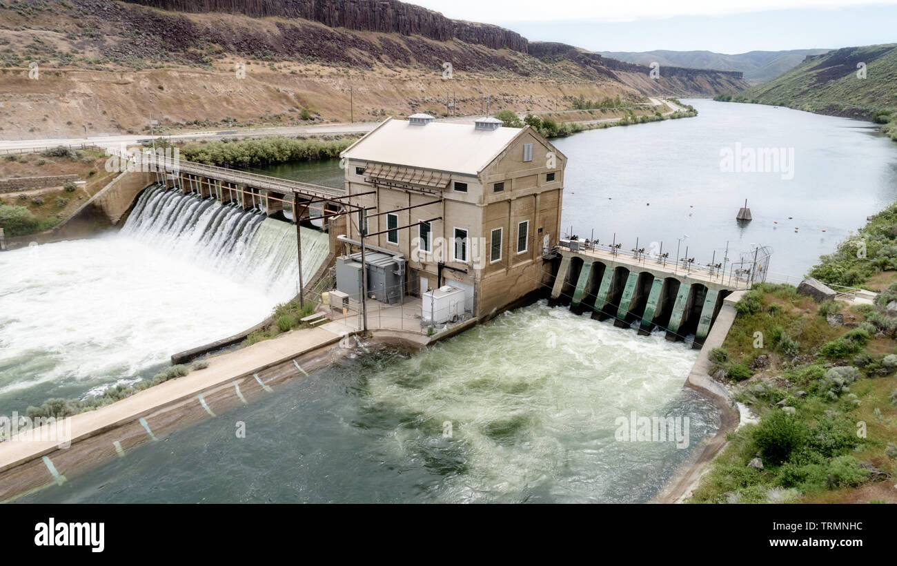 Historic Dam that diverts water for irrigation on a wild river in Idaho Stock Photo