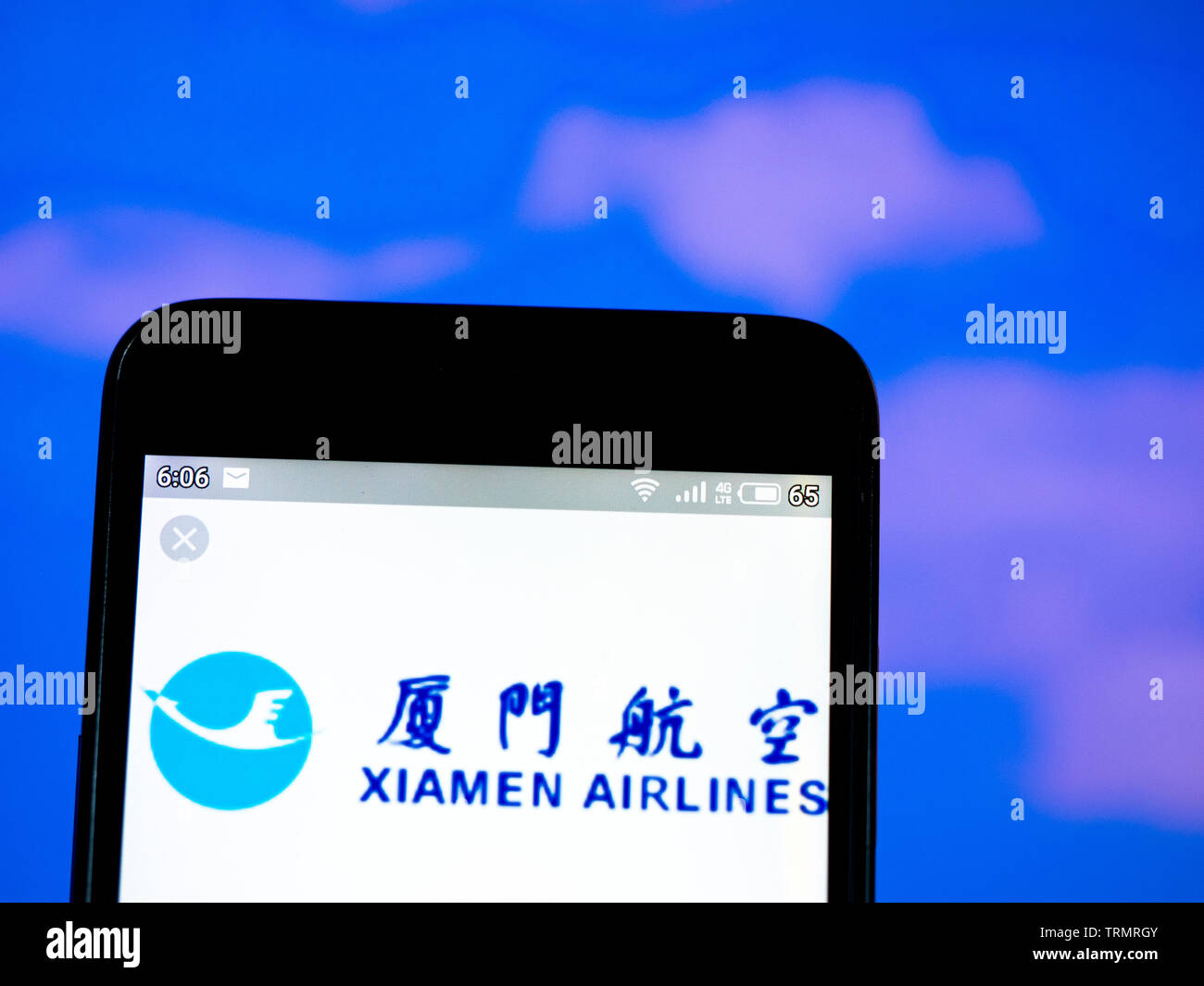 In this photo illustration the XiamenAir logo is seen displayed on a smartphone Stock Photo