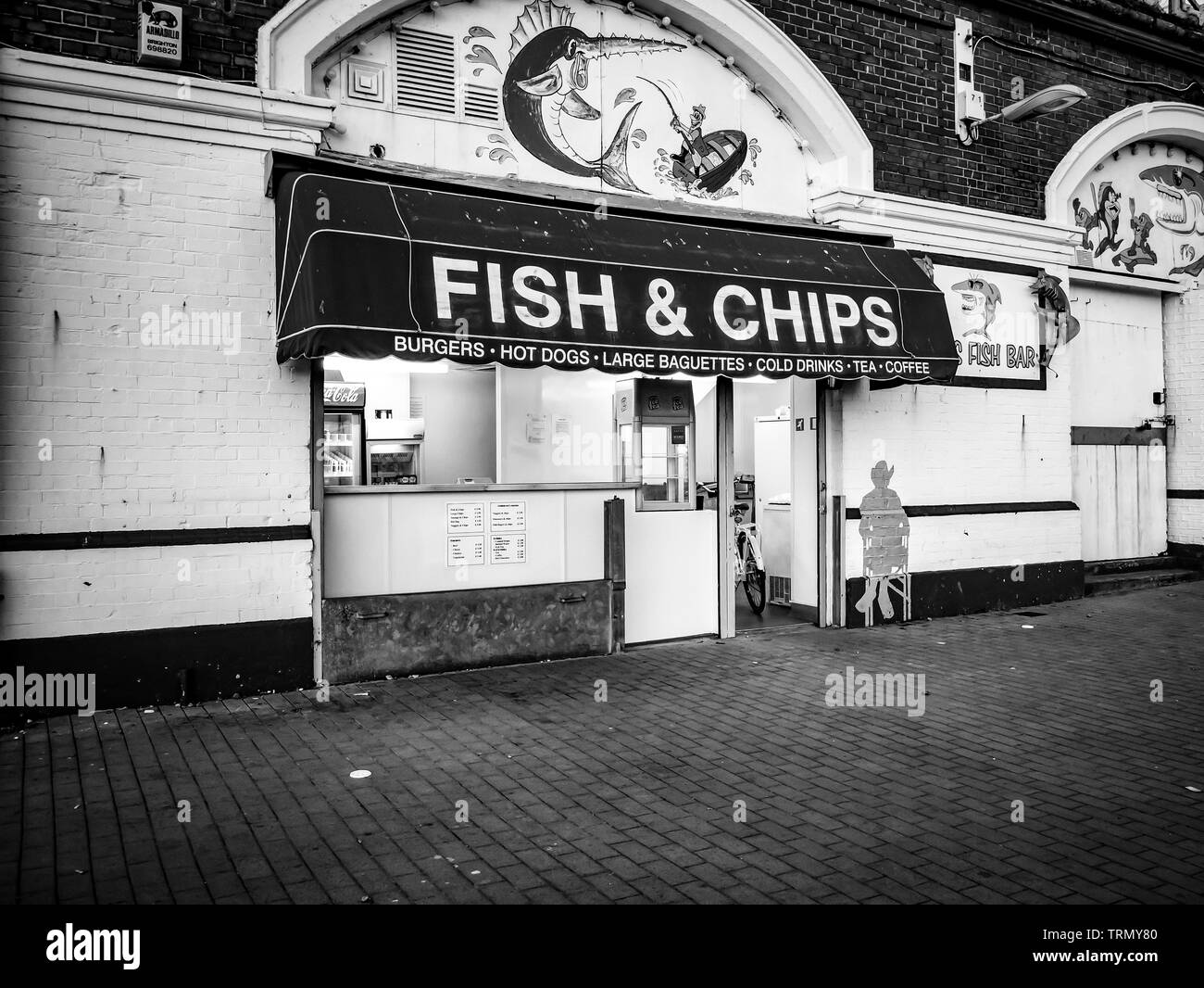 Fish and chip shop Brighton sea front in Black and White Stock Photo