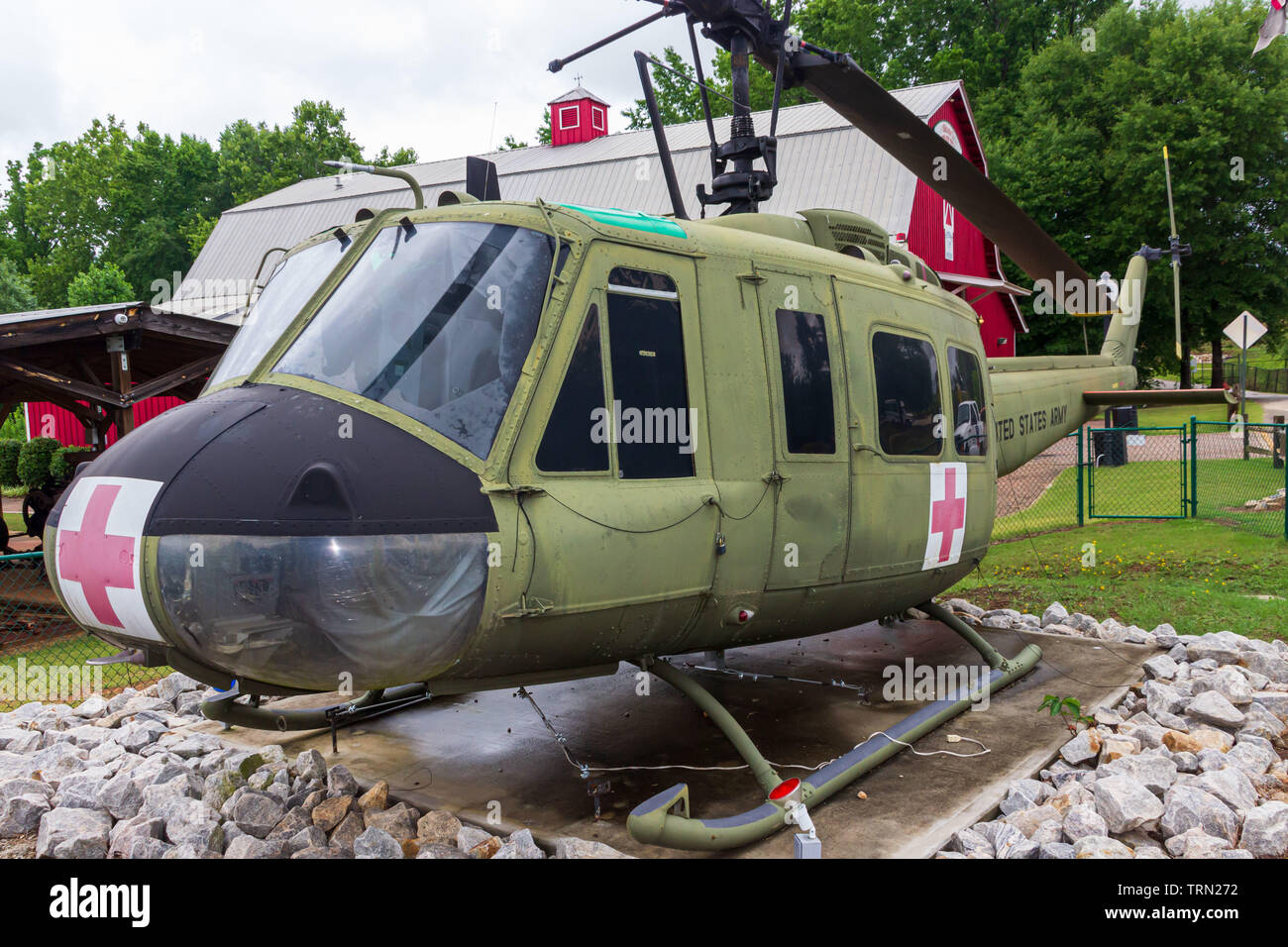 McDonough, Georgia / USA - June 9, 2019: A Huey UH-1F model 205 helicopter on display outside of the Veteran's Museum in Heritage Village at Heritage Stock Photo