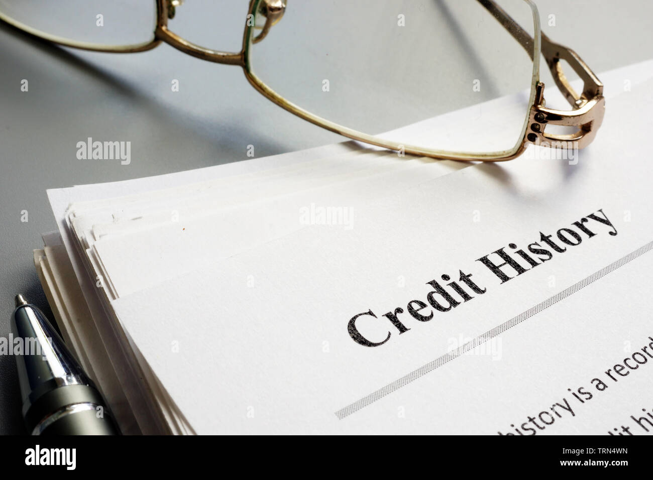 Credit history report papers and pen. Stock Photo