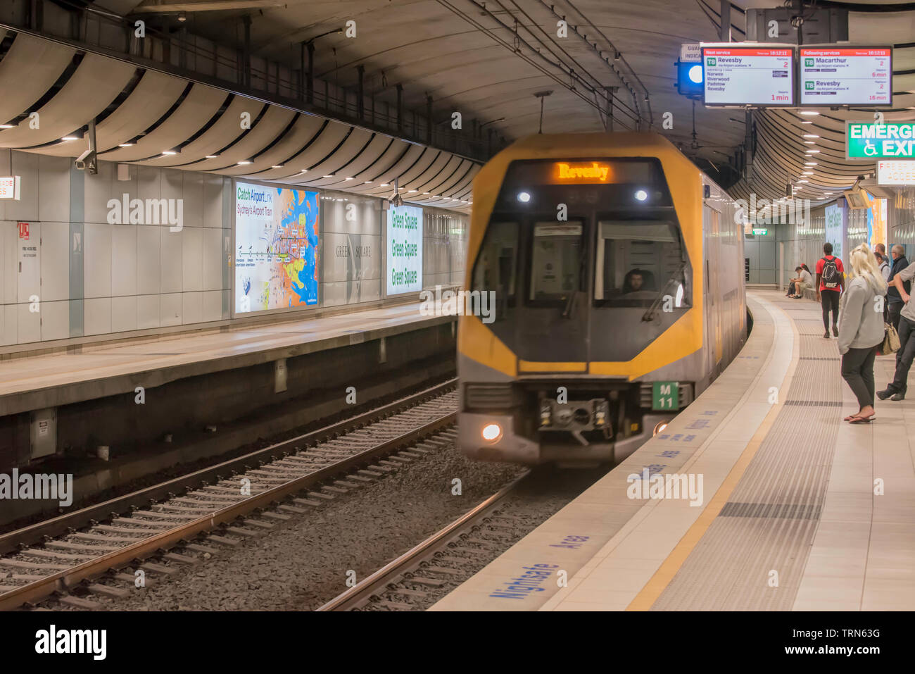 An M Set Millennium train enters Green Square underground railway station on the line joining Sydney airport and the city in Australia Stock Photo