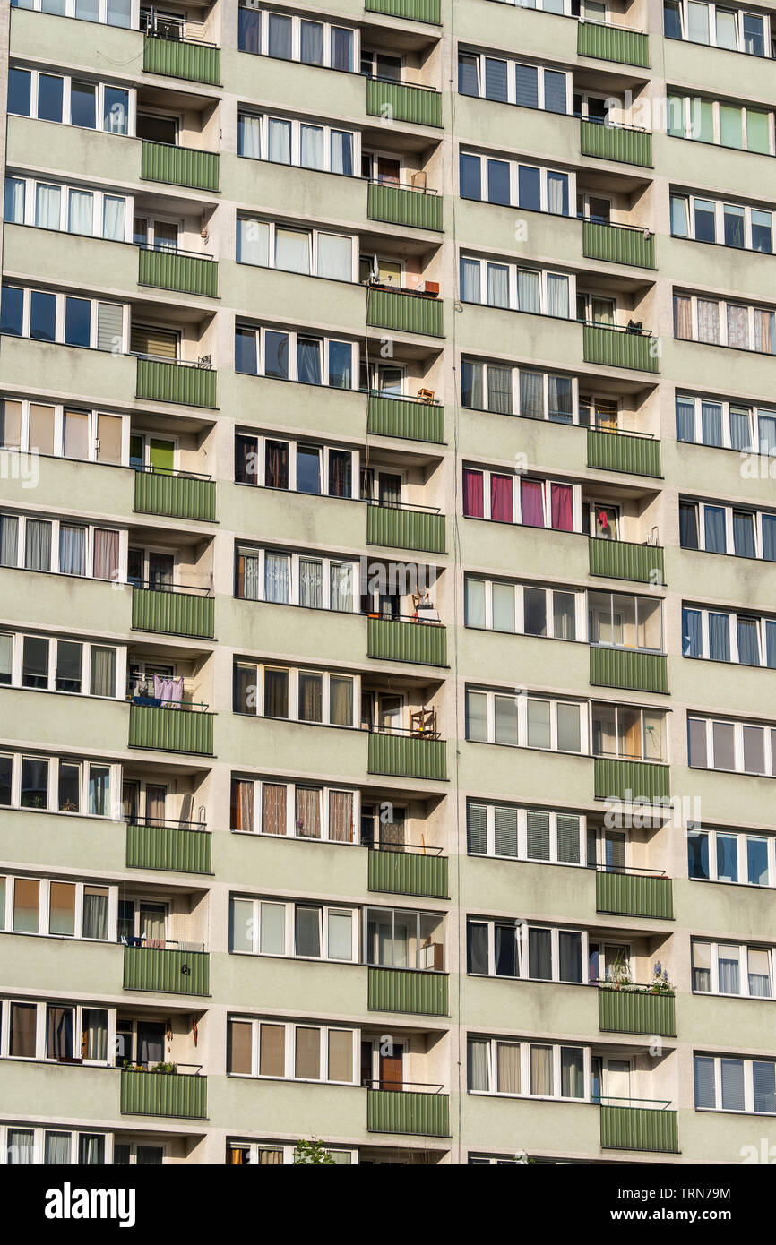 Residential block of flats background or texture, concrete prefab multi-family building with balconies in Warsaw, Poland. Stock Photo