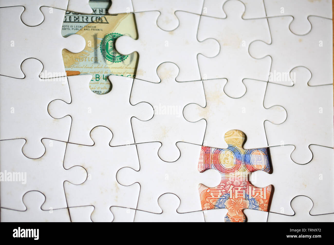 money behind the puzzle discoverable Stock Photo