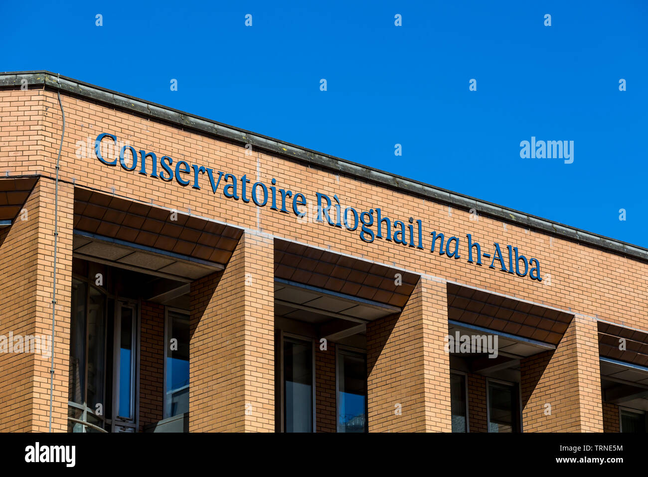 A Royal Conservatoire of Scotland sign in Gaelic, Hope Street in Glasgow city centre, Scotland, UK Stock Photo